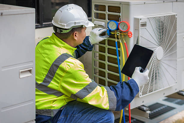 Professional Hvac technician working in Ozark, AL